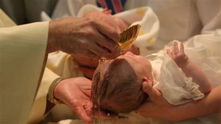 Angry priest slaps baby who wouldn’t stop crying during baptism