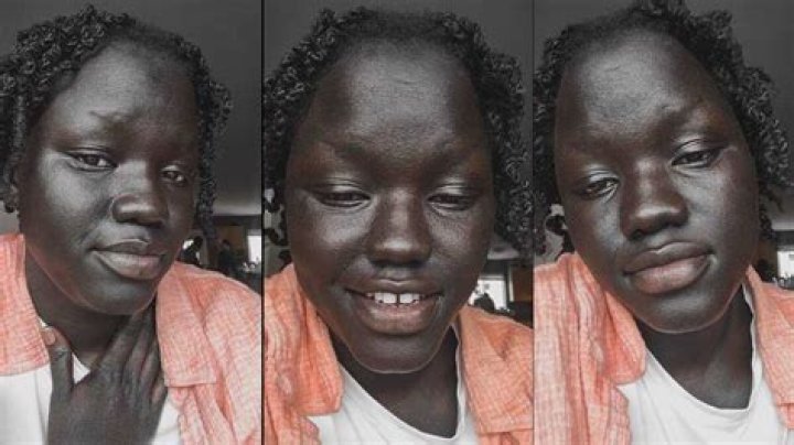 Confident Lady With Shiny Black Skin and Sparkling White Teeth Smiles for Camera, Video Goes Viral