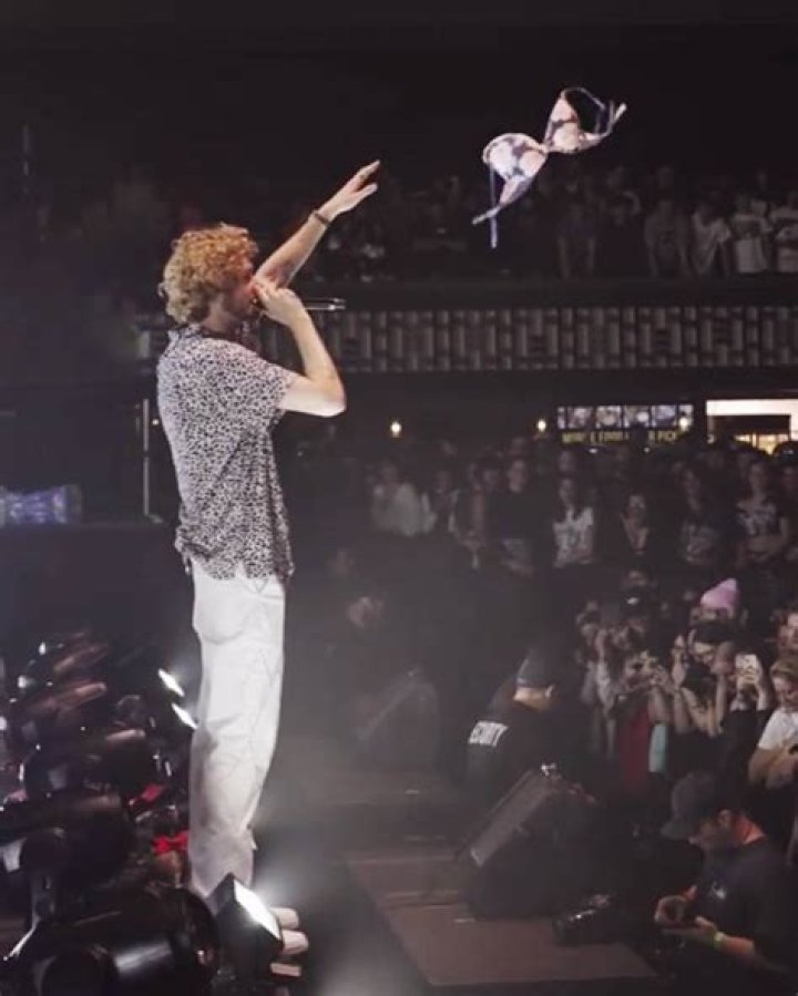 Drake Shows Off Huge Collection of Bras Thrown at Him by Fans During Concert