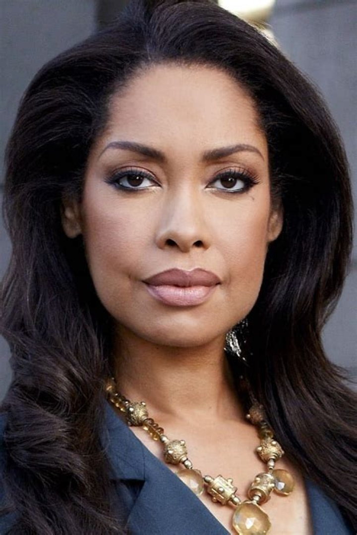 Gina Torres, Bio, Wiki, Age, Height, Parents, Husband, Daughter, Suits, and Net Worth